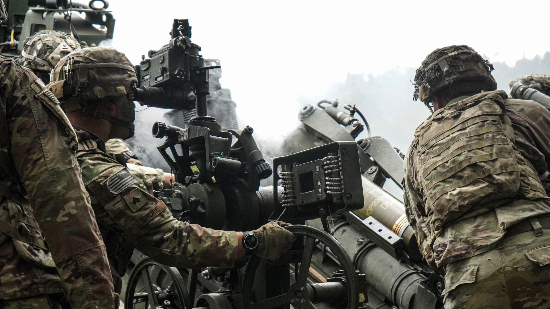 Les soldats américains du 319th Airbone Field Artillery Regiment. 